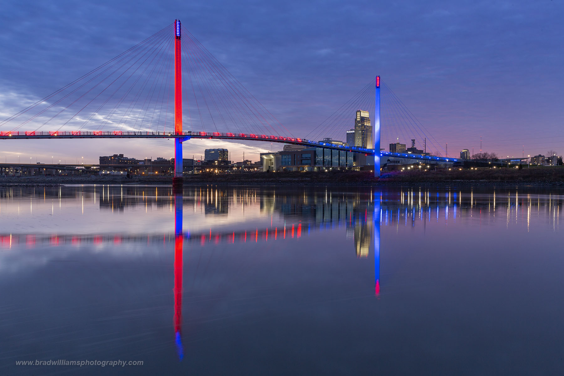 The upgraded bridge lights reflect off the Missouri River in Downtown Omaha.  2020 Marks the first time I have photographed from...