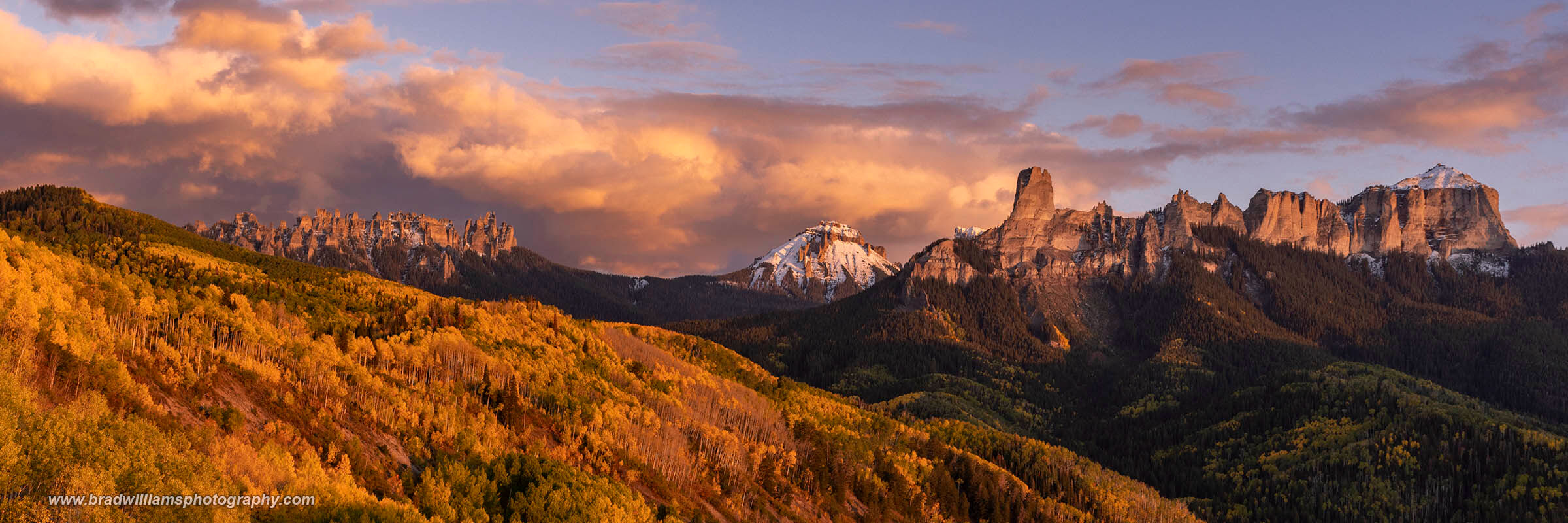 Its a great fall afternoon and suns warm glow is reflecting on the iconic Chimney Rock on the Owl Creek Pass in the Uncompahgre...